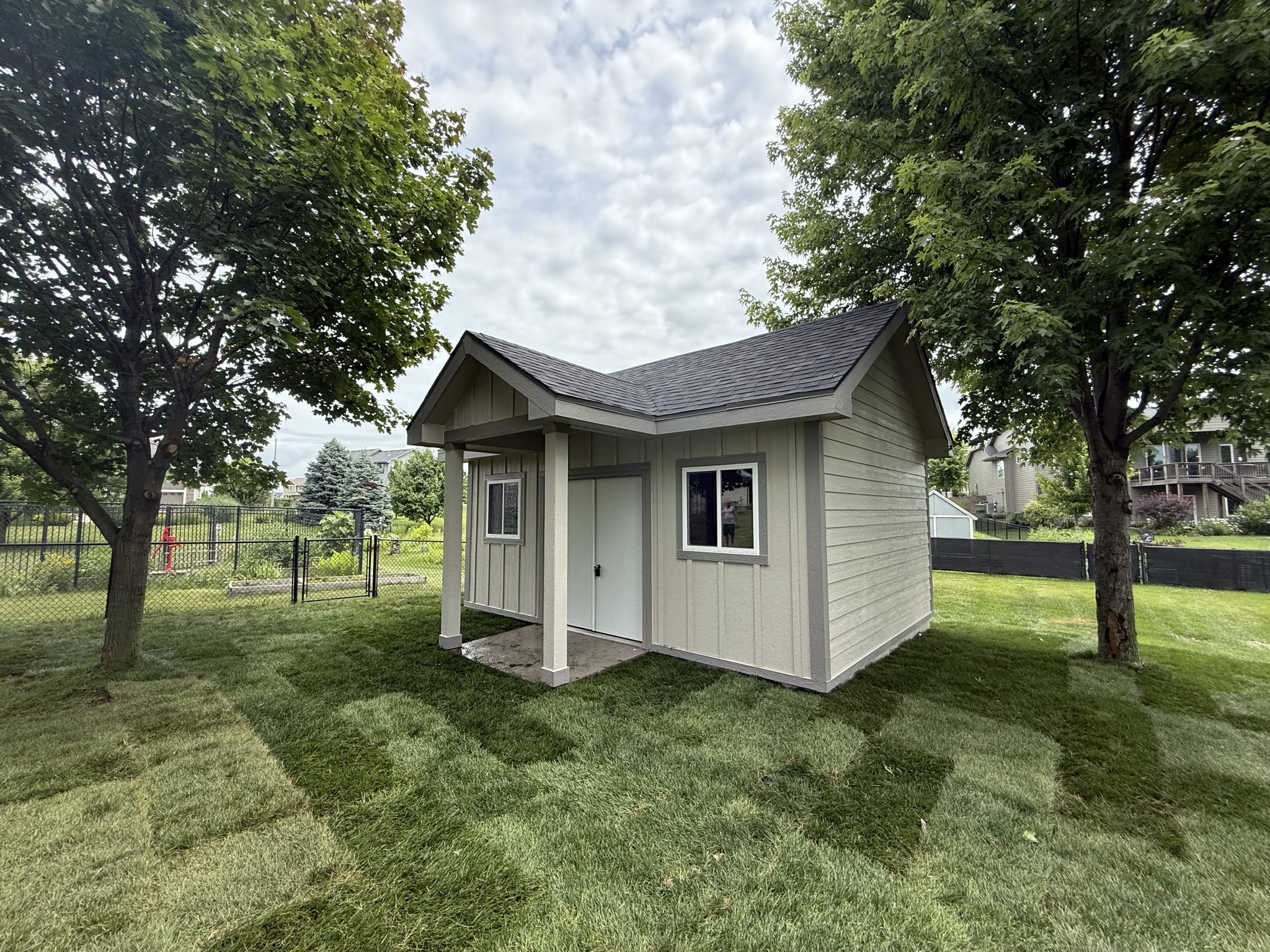 Custom shed with covered front porch