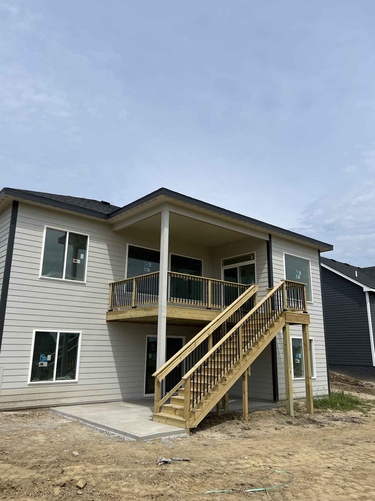 Two-story deck with covered upper level and staircase