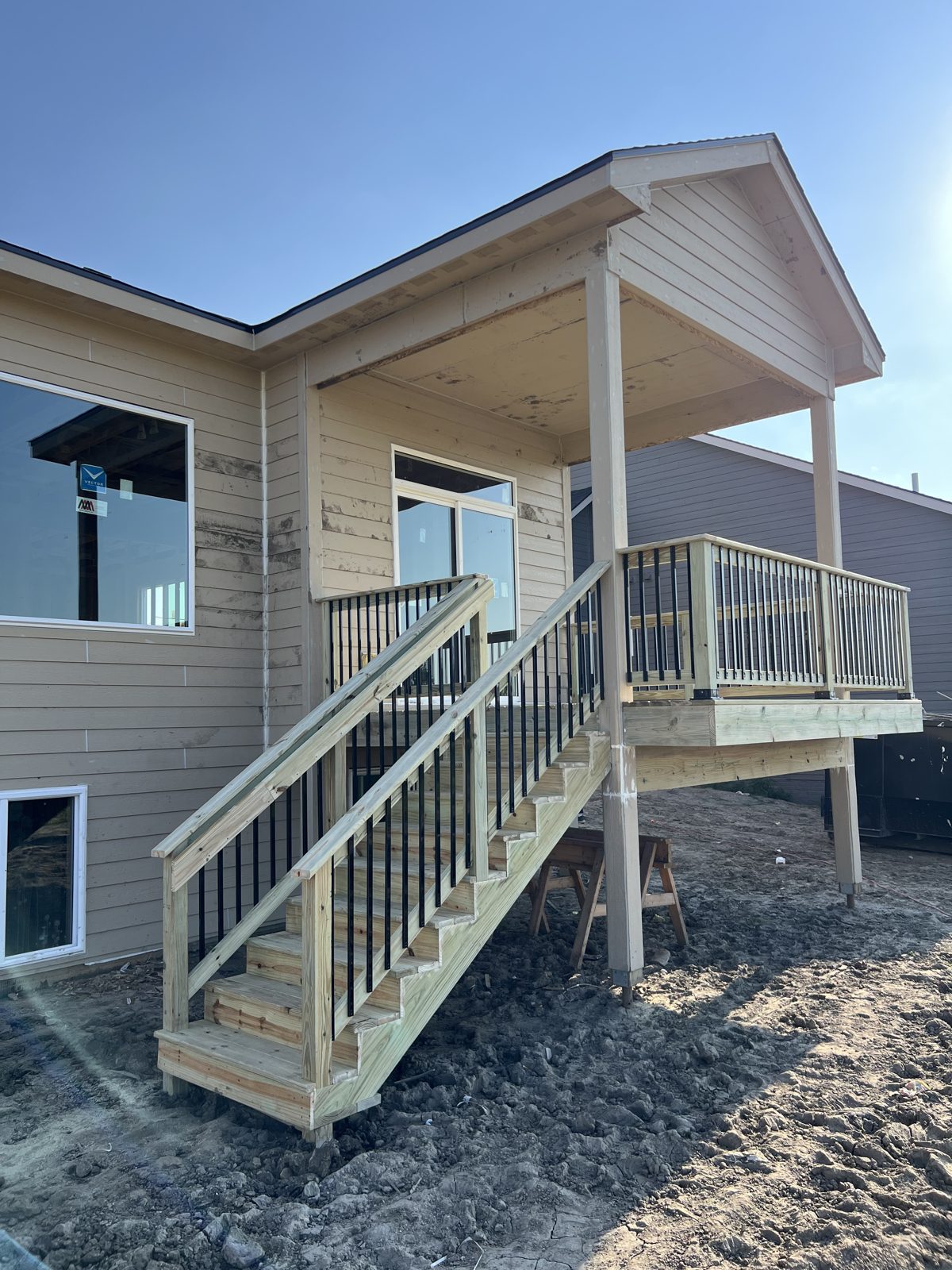 Elevated deck and staircase under construction