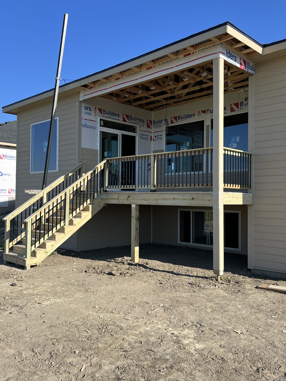Covered deck framing with staircase